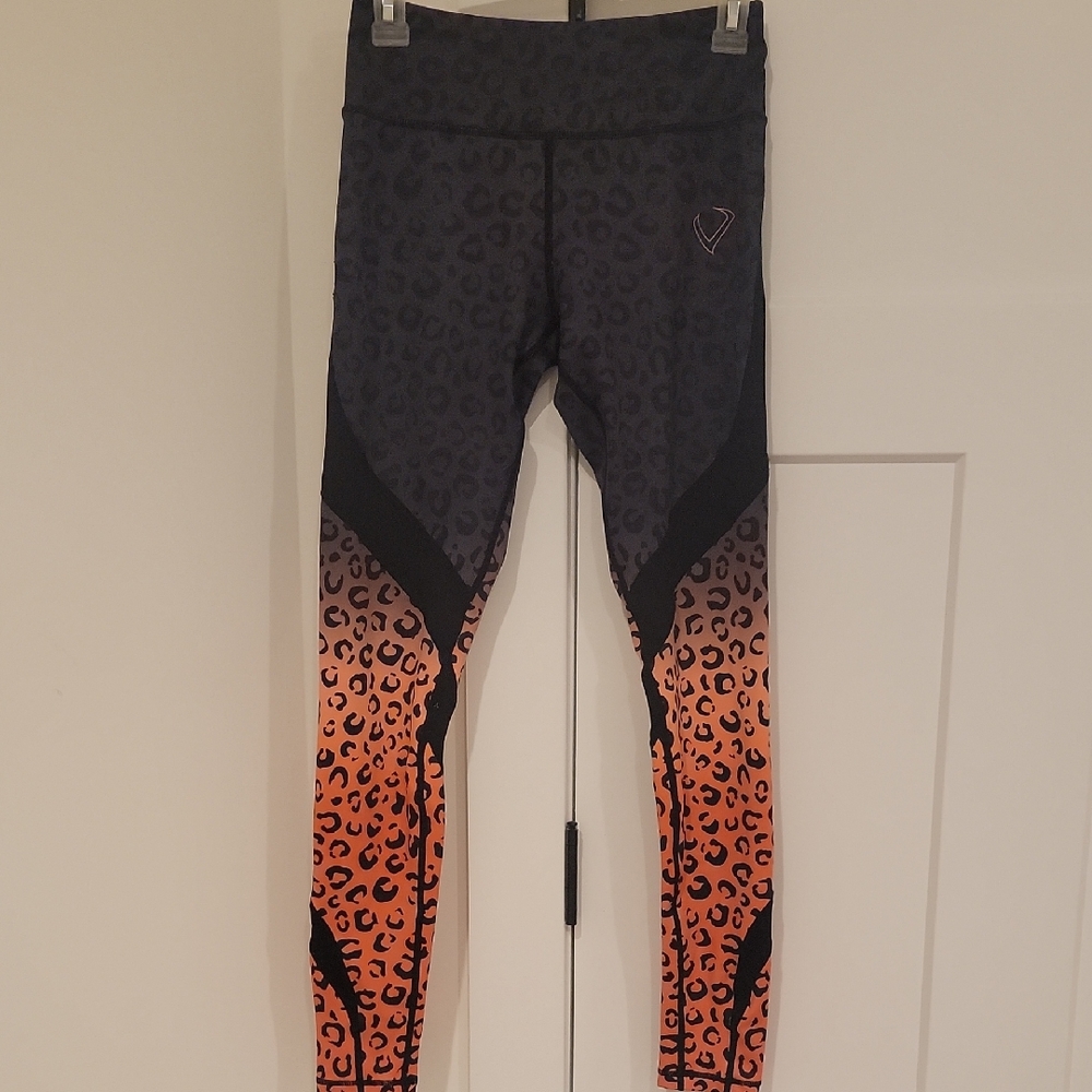 Leopard Print Leggings in Black and Orange By Violate The Dresscode. Worn Once